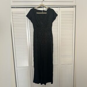 Black Satin Jumpsuit with Subtle Flower Print - Francesca’s Size M